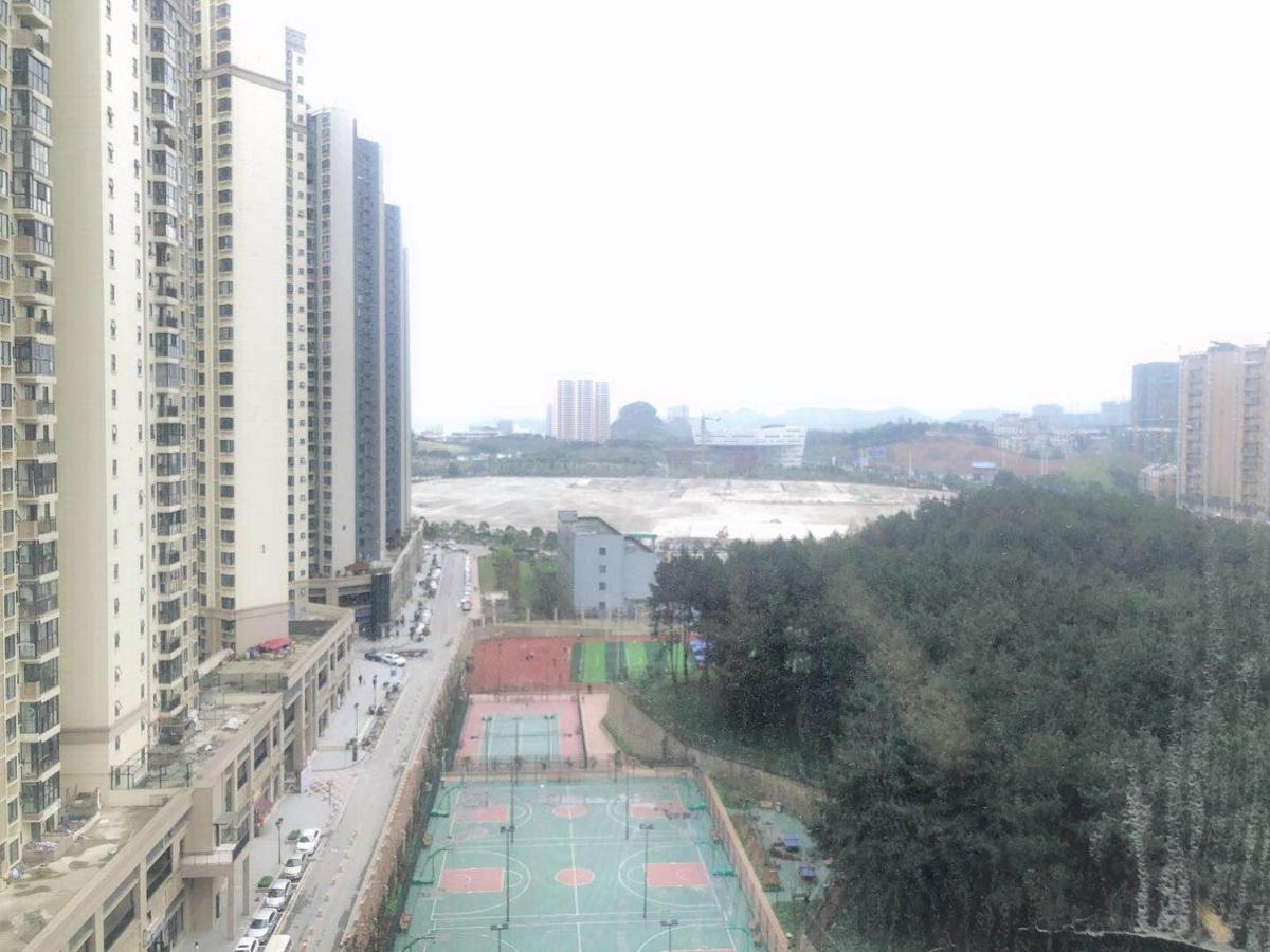 Iu Hotel Guiyang Olympic Sports Center China Resources Vientiane Exteriör bild